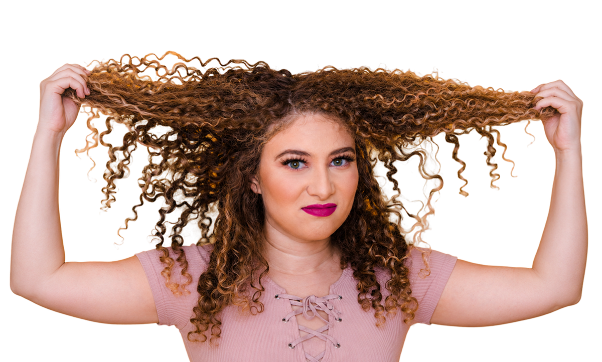 Woman holding a hair brush